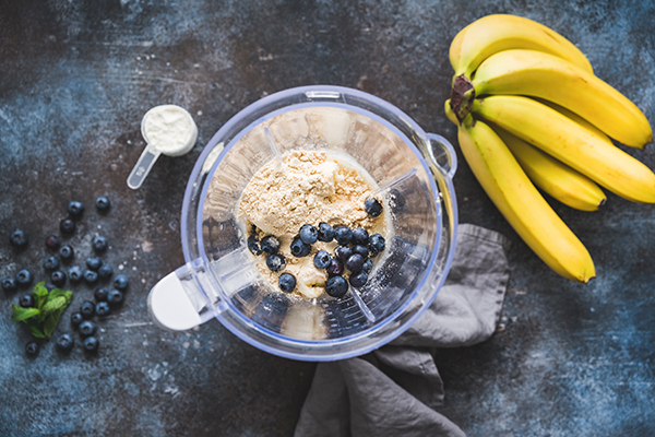 Shakeology, fruit in blender.