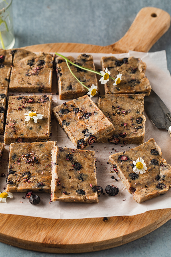 Shakeology No Bake Blueberry Pie Bars on a cutting board