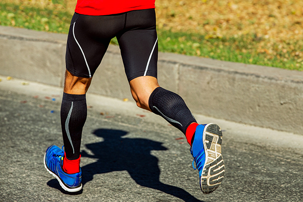 Male runner wearing compression socks