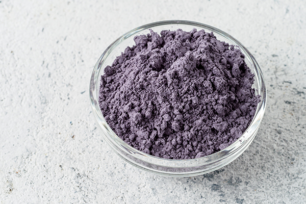 Butterfly pea flower powder in glass bowl