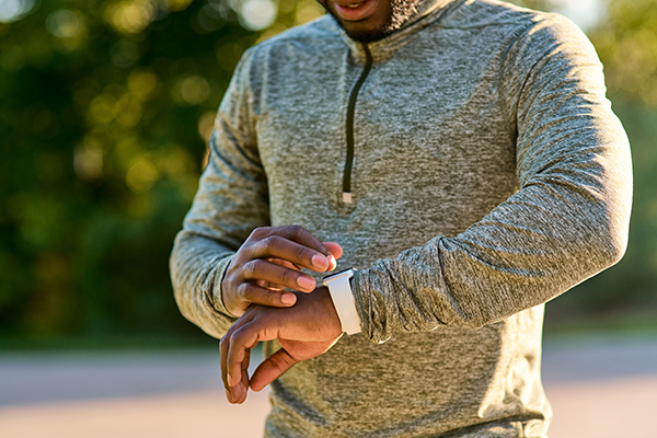 Man checking his fitness tracker