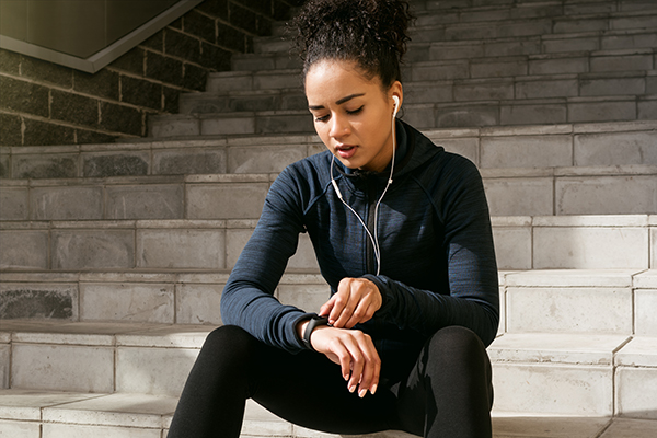 Woman checking her fitness tracker