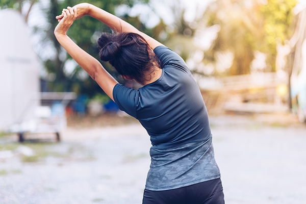 Woman stretching before run