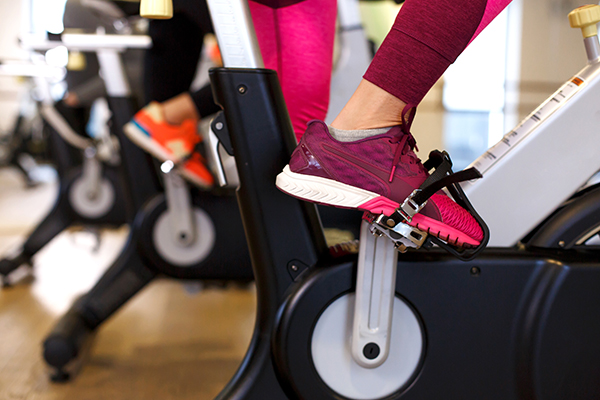 People on bikes in group fitness class