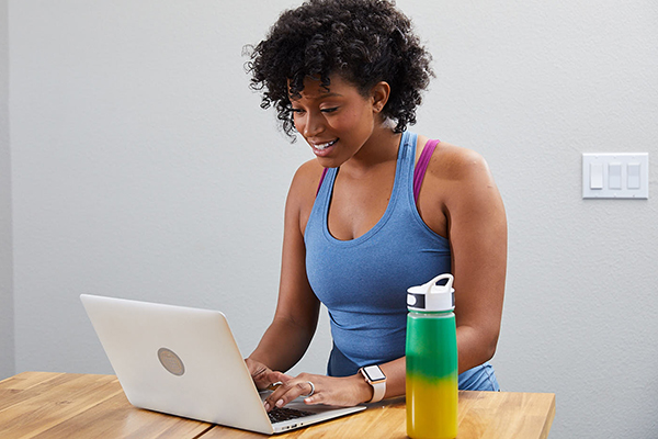 Woman connecting with her BODgroup online