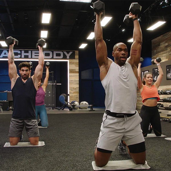 Amoila Cesar lifting weight on the set of 645