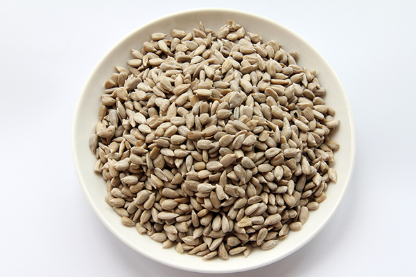 Sunflower seeds on a saucer