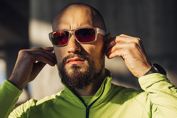 Man wearing polarized sunglasses outside