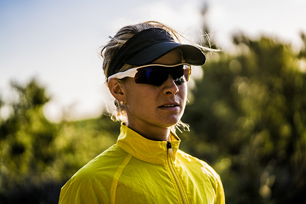 Female runner wearing wraparound sunglasses