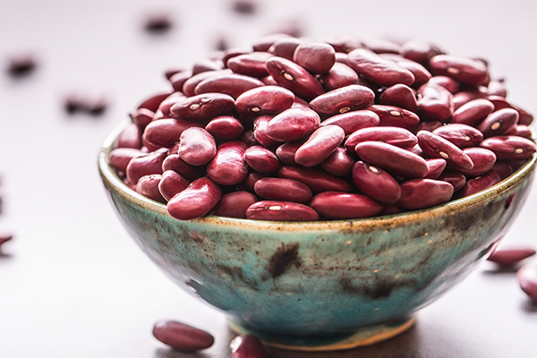 Red beans in bowl on table.