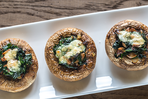 Baked mushrooms stuffed with spinach and cheese