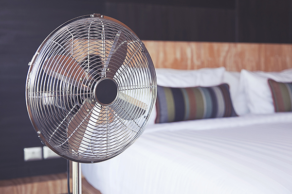 Electric fan in a bedroom