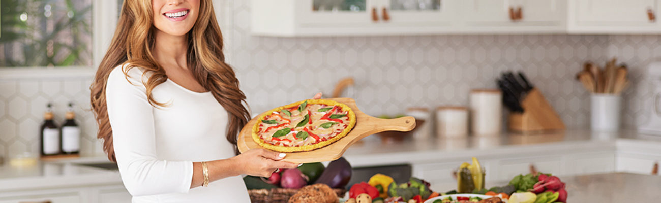 Ilana Muhlstein in her kitchen with food