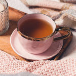 Rose, Mint, and Pomegranate BEVVY Tonic in pink tea cup