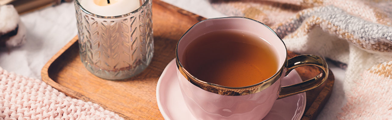 Rose, Mint, and Pomegranate BEVVY Tonic in a pink tea cup