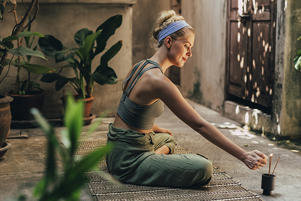 Woman doing yoga outdoors