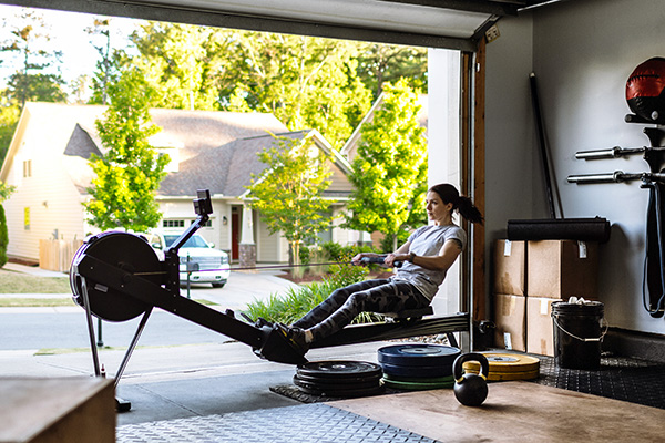 Rowing Machine 101: Benefits, Warm-Ups & Full-Body Workouts - EVO Fitness