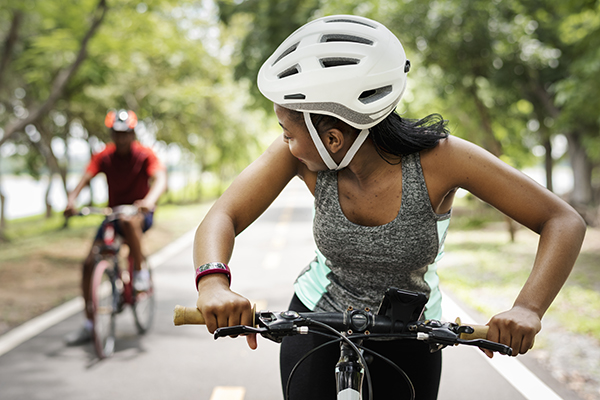 Couple cycling in a park