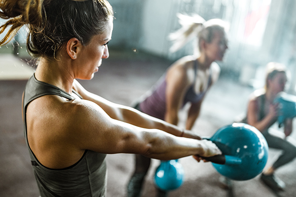 Women doing kettle bell swings