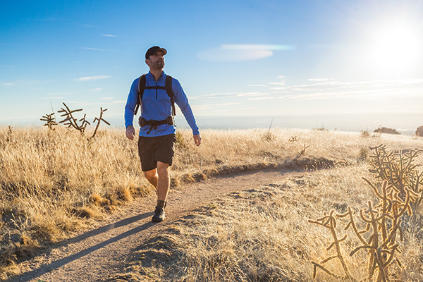 Man hiking outside for exercise