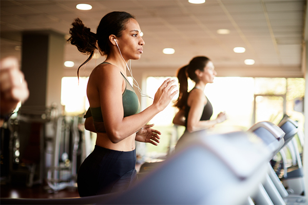 woman running on treadmill | aerobic capacity