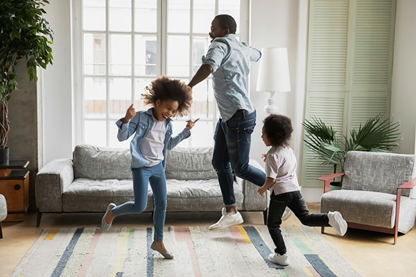 Dad dancing with kids