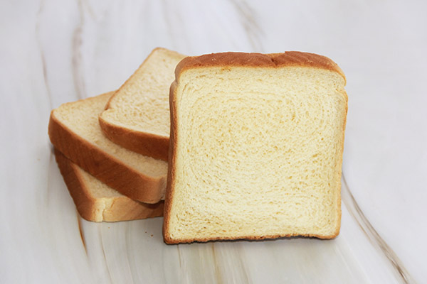 Four slices of white bread