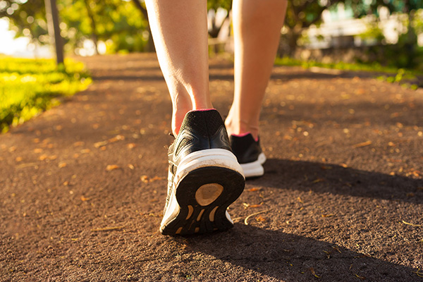 Woman walking on a path