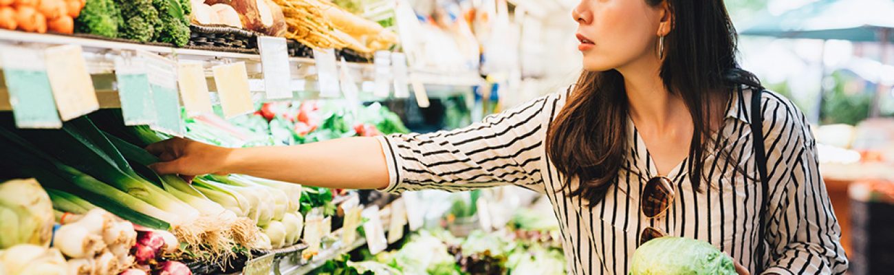 Woman shopping for vegetables