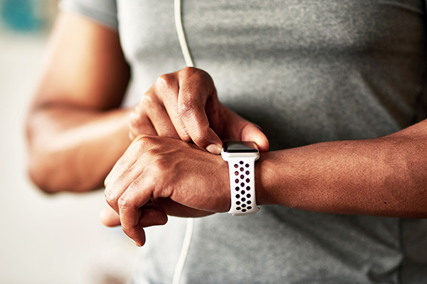 Man checking his fitness tracker