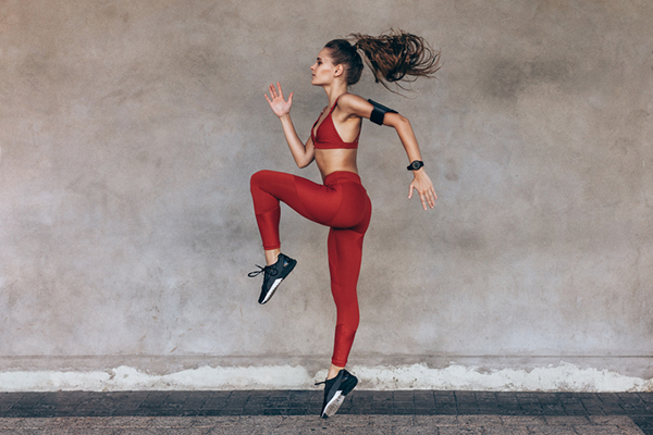 woman high knees exercise | AMRAP