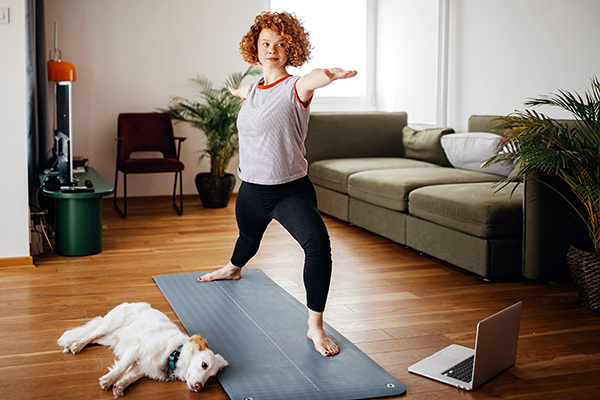 Woman doing yoga at home