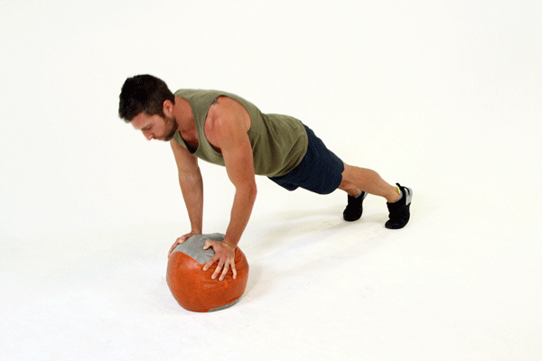 man doing medicine ball push up | Medicine Ball Push Up
