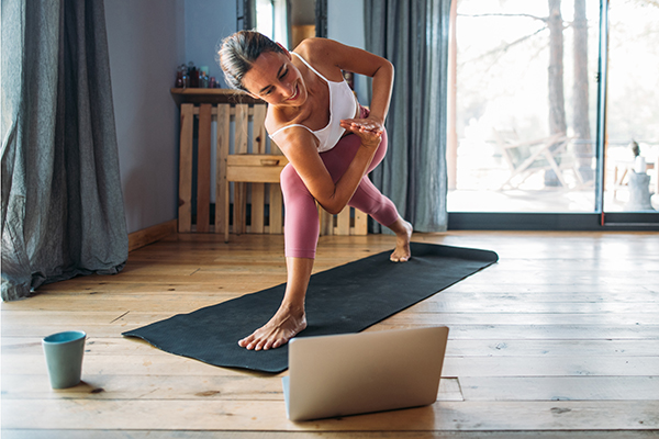 Woman doing yoga at home