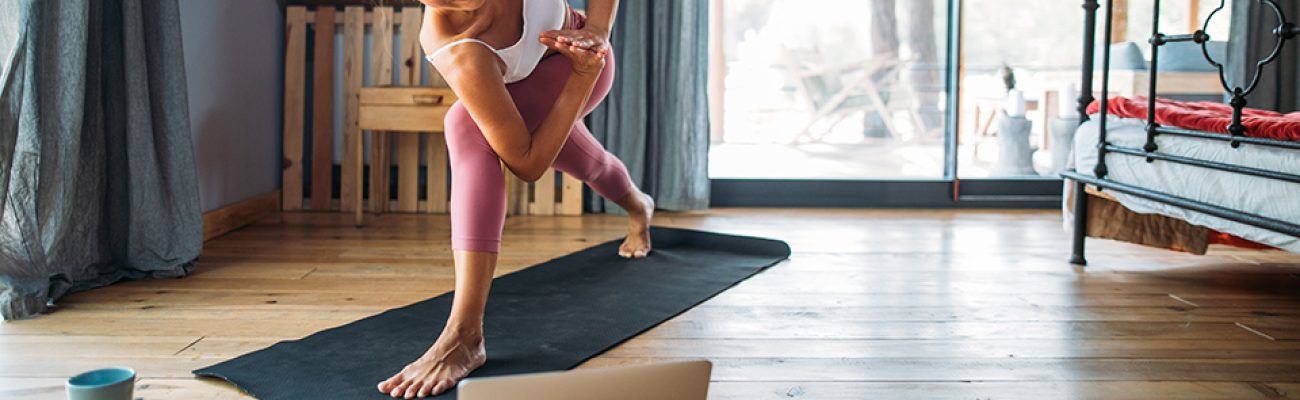 Woman doing yoga at home