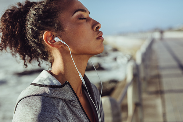 Woman runner taking a breather