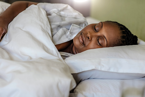 Woman asleep in bed