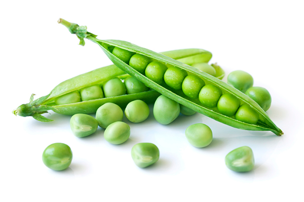 peas on white background | best frozen veggies