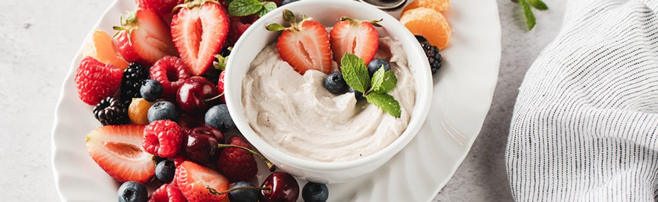 Cookies & Creamy Fruit Dip in a bowl on fruit plate