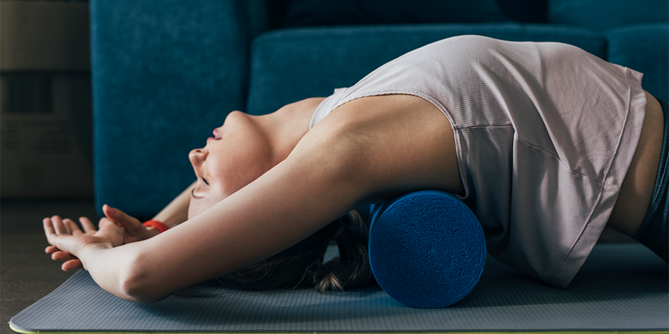 woman foam rolling her back | Best Foam Rollers