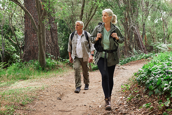 Couple walking in the woods