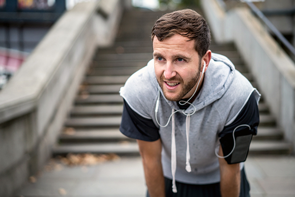 Man taking a breather after workout