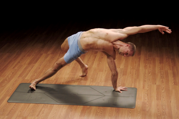 Yoga52 Instructor Holds Fallen Triangle Pose | Cardio Yoga