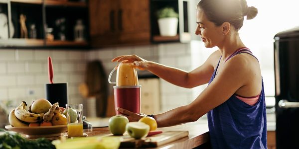 Woman Makes Shake | Benefits of Protein Shakes