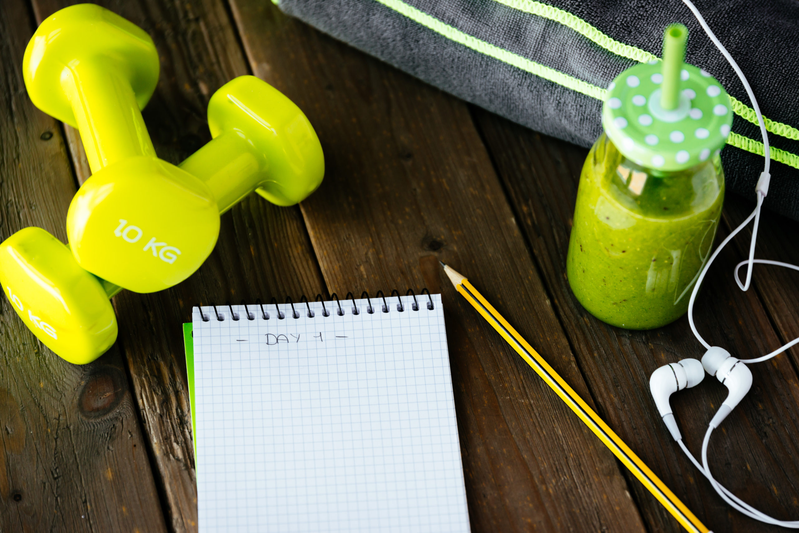 Workout Equipment and Notebook | Set Cycling Goals