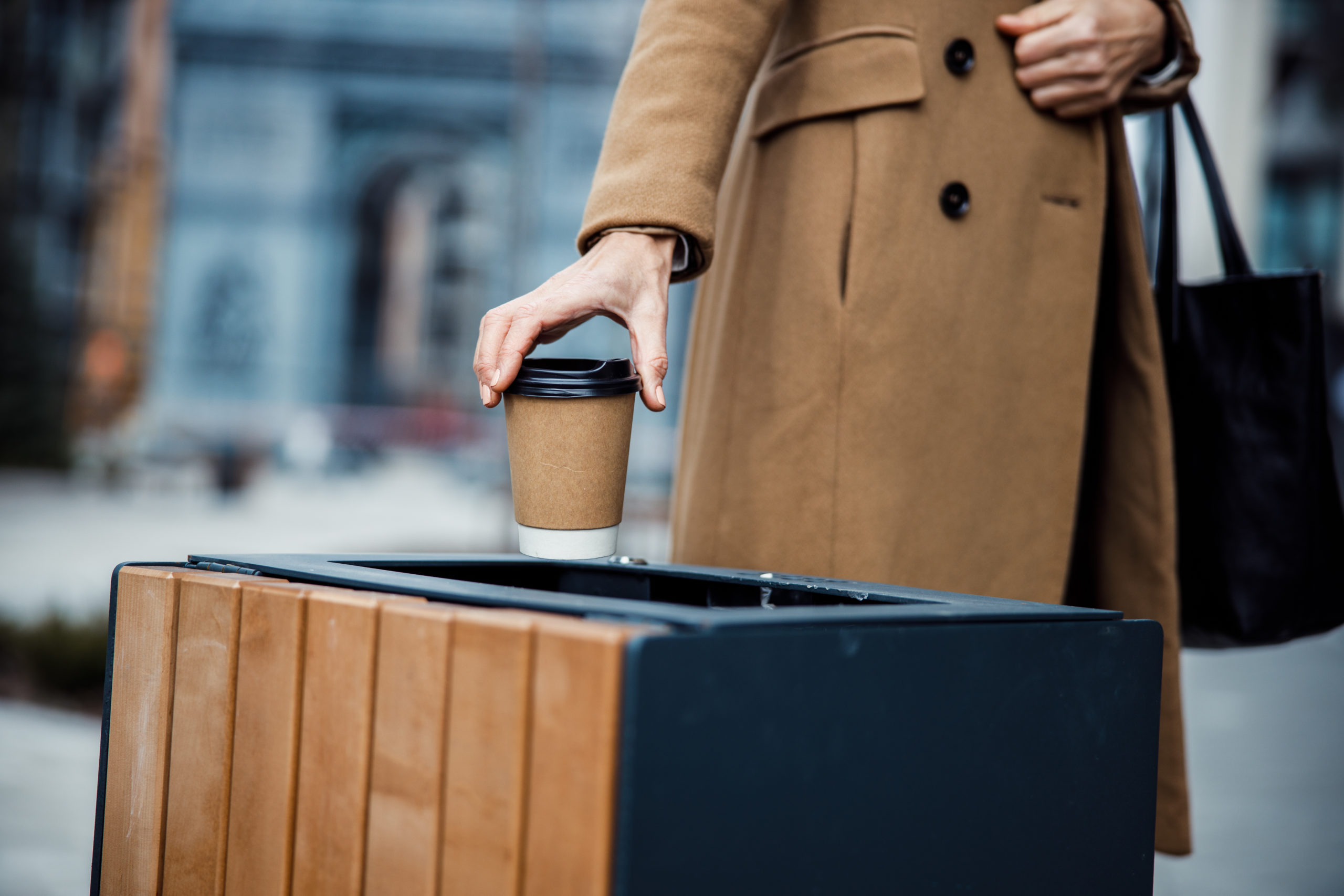 Coffee Cup Being Thrown Away | how much caffeine should you have a day