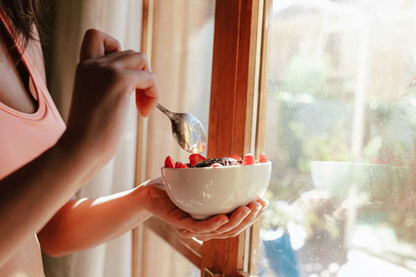 Fit Woman Eats Bowl of Fruit | Cycling Diet