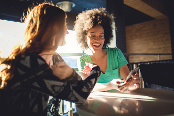 Women Hanging Out on Phones | Inexpensive Self Care