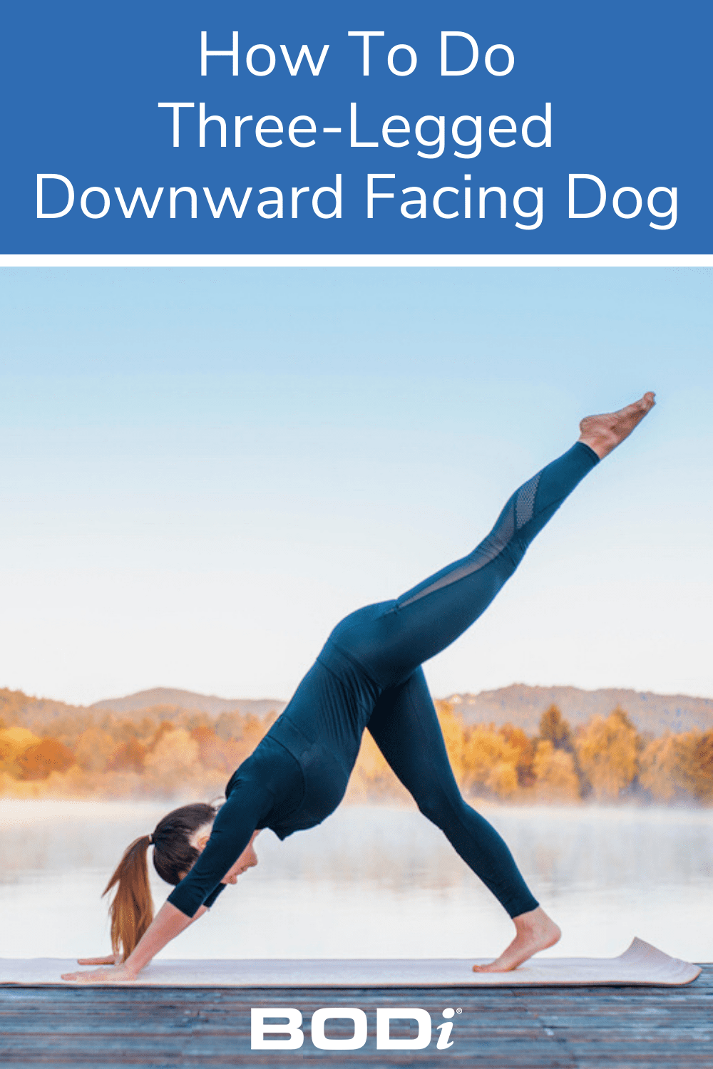 Woman Holds Pose on Bay Pin Image | Three Legged Downward Facing Dog