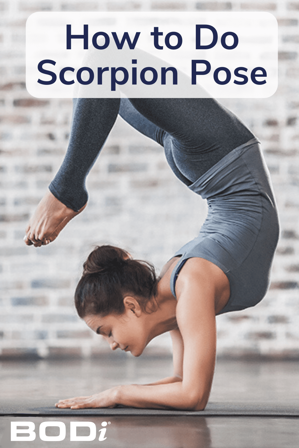 Woman Holds Scorpion Pose with BODi Pin | Scorpion Pose